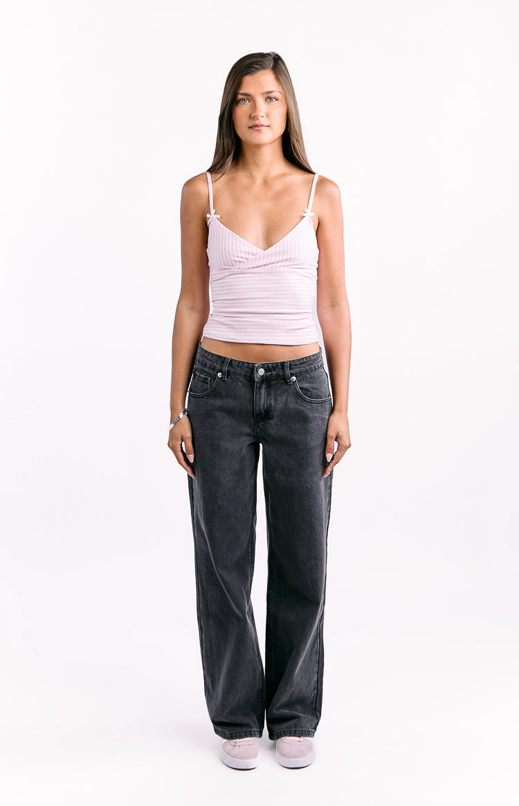 Front view of black washed denim low waist baggy leg jeans
