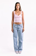 A pair of light blue low-rise jeans with a relaxed straight-leg fit.