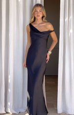 Black satin maxi dress with an asymmetrical cowl neck and off-shoulder detail, flowing silhouette