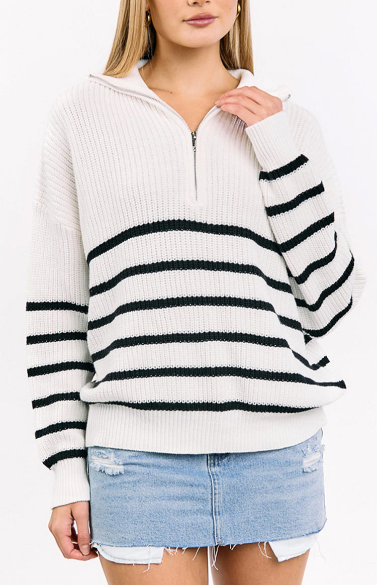 Cream ribbed knit jumper with black horizontal stripes and an open quarter zip neckline