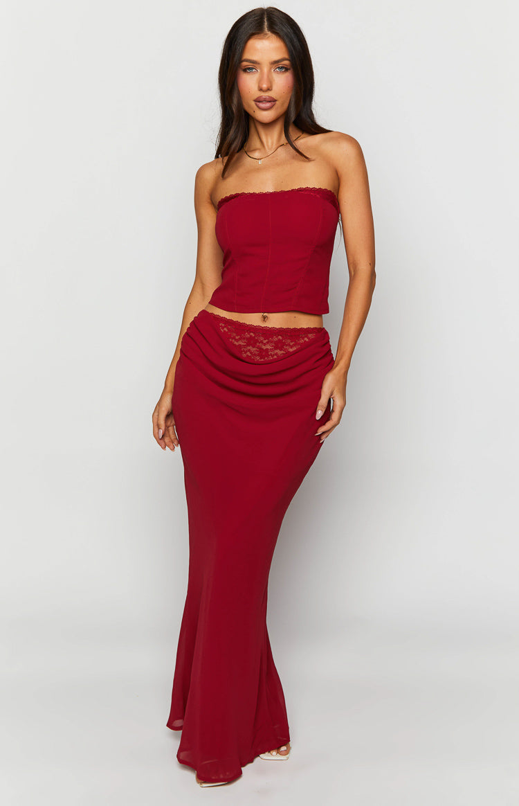 Crimson red strapless corset top with a lace trim along the neckline and visible boning detail