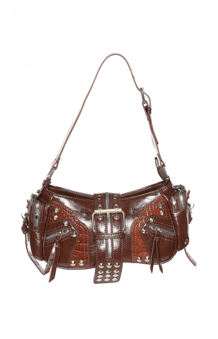 Glossy brown PU shoulder bag with silver hardware, central buckle strap, studded details, and crocodile-embossed panels