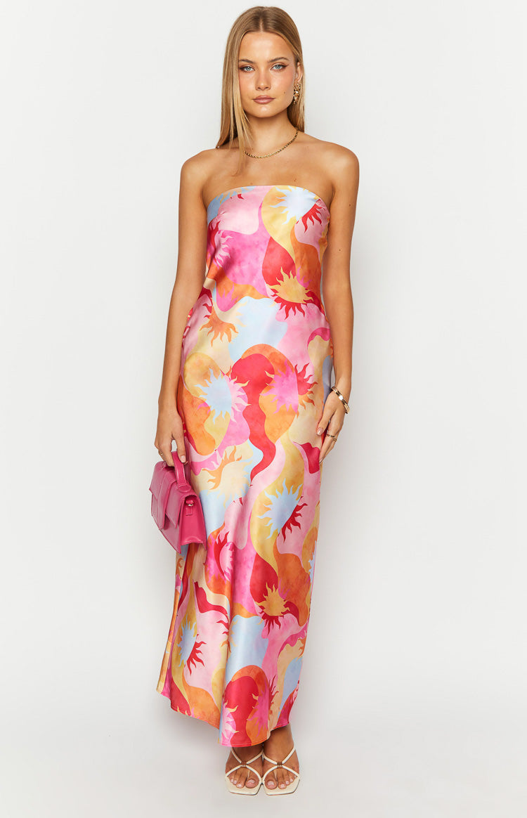Front view of a strapless maxi dress with a vibrant pink, orange, and blue sun print