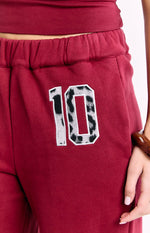 Dania Burgundy Leopard Star Track Pants Image