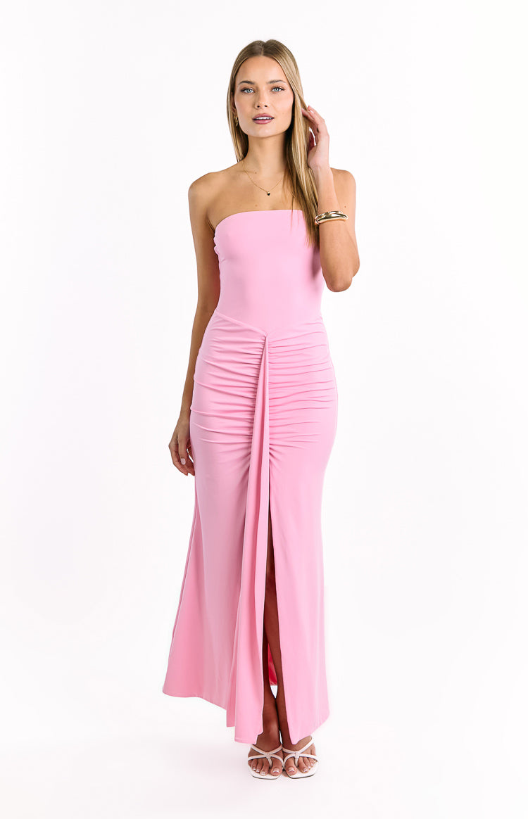 Pink strapless maxi dress with a straight neckline, ruched waist detail, and a high front slit