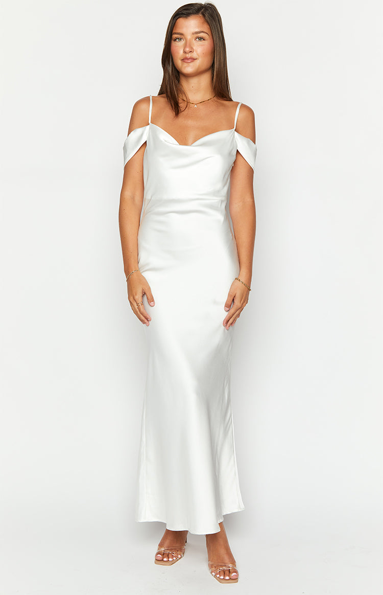 Front view of a white satin maxi dress with a draped cowl neck, thin spaghetti straps, and off-shoulder sleeves