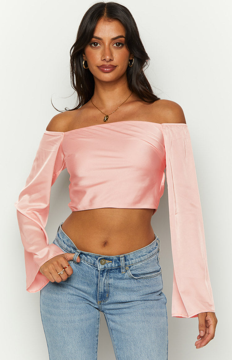Beginning Boutique Darcie Pink Satin Long Sleeve Top pink satin off-shoulder cropped top with long bell sleeves