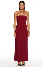 Full-length front view of a burgundy crepe maxi dress with a fitted bodice and criss-cross halter straps