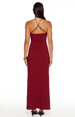 Rear view of a burgundy crepe maxi dress showing the criss-cross spaghetti straps and low back