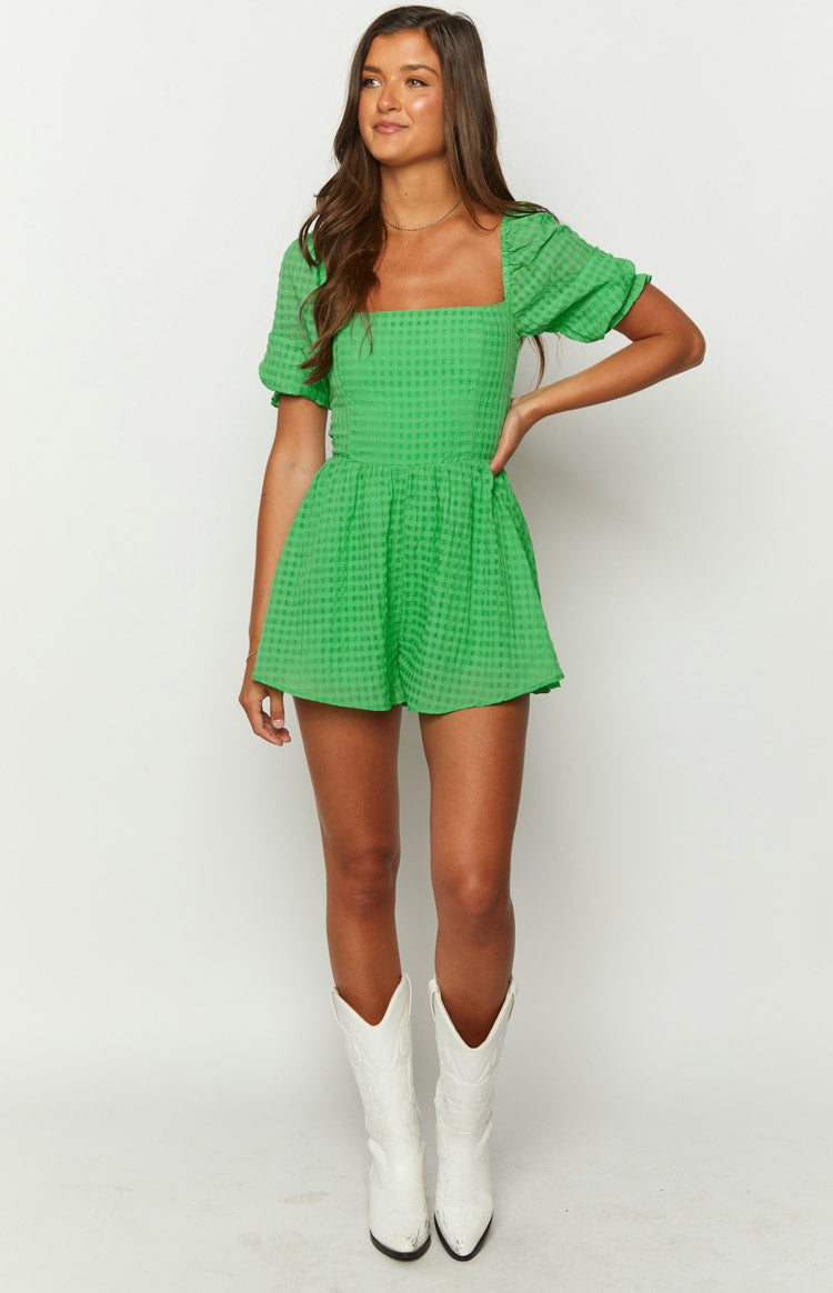 Bright green gingham playsuit with a square neckline, short puff sleeves, and a fitted waist