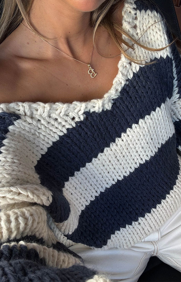 Beginning Boutique Delvey Navy Striped Chunky Knit Sweater navy and white striped chunky knit sweater with a wide chunky knit neckline
