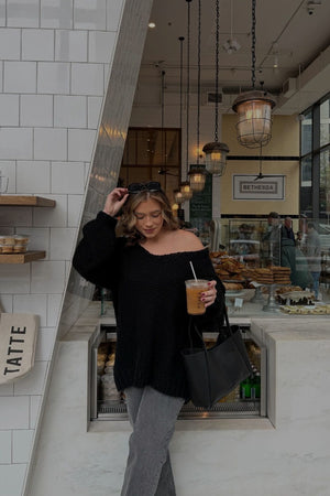 Beginning Boutique Delvey Black Chunky Knit Sweater black oversized V-neck chunky knit sweater with long sleeves