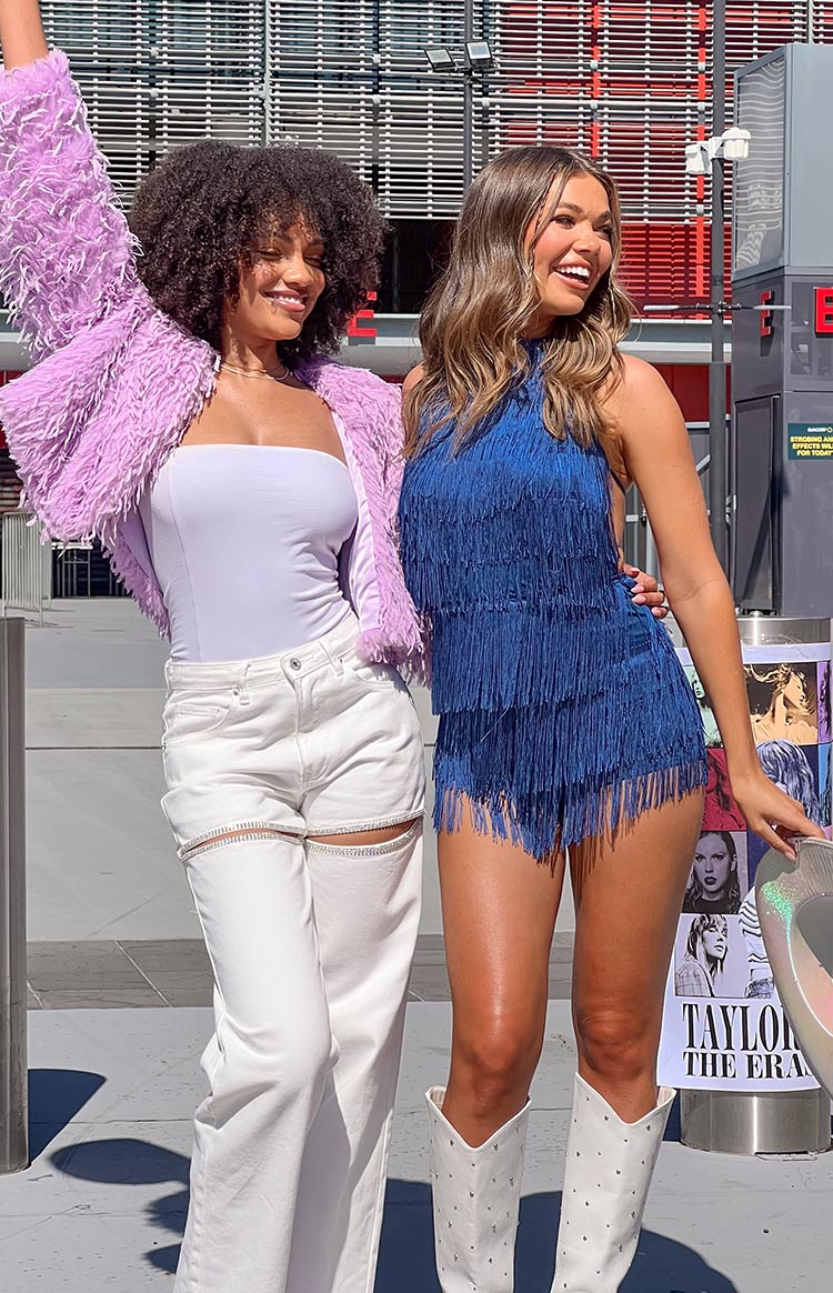 Blue halter neck playsuit with tiered fringe tassels covering the entire garment