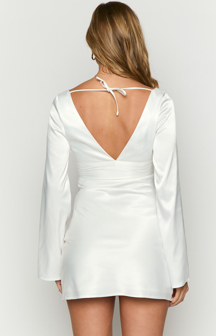 Back view of a white satin mini dress with a deep V-back, tie neck detail, and wrapped waist