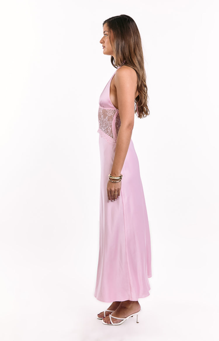 Side view of a pink satin maxi dress with a lace panel on the side of the bodice