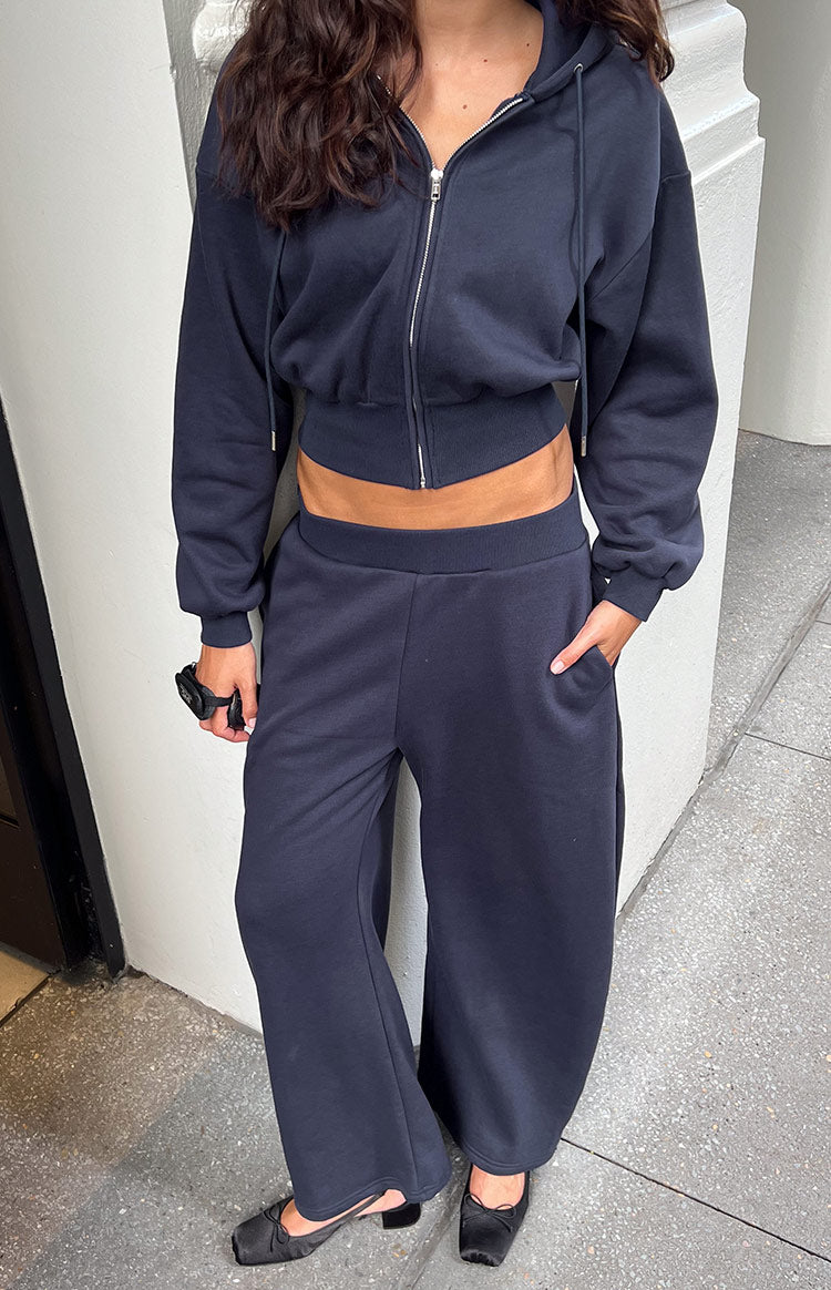 Beginning Boutique Dora Navy Barrel Leg Track Pants navy barrel leg track pants with an elasticated waistband and side pockets