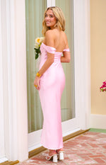 Side view of the light pink off-shoulder maxi dress showing the fitted silhouette and satin fabric