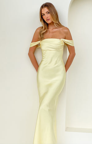 Beginning Boutique Ella Light Yellow Off Shoulder Formal Maxi Dress light yellow satin off-shoulder maxi dress with twisted bust detail