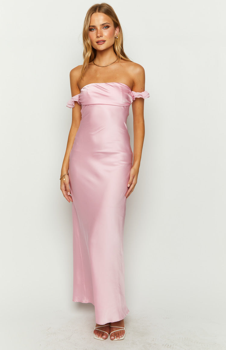 Front view of a pink satin maxi dress with an off-shoulder draped neckline and small ruffled sleeves