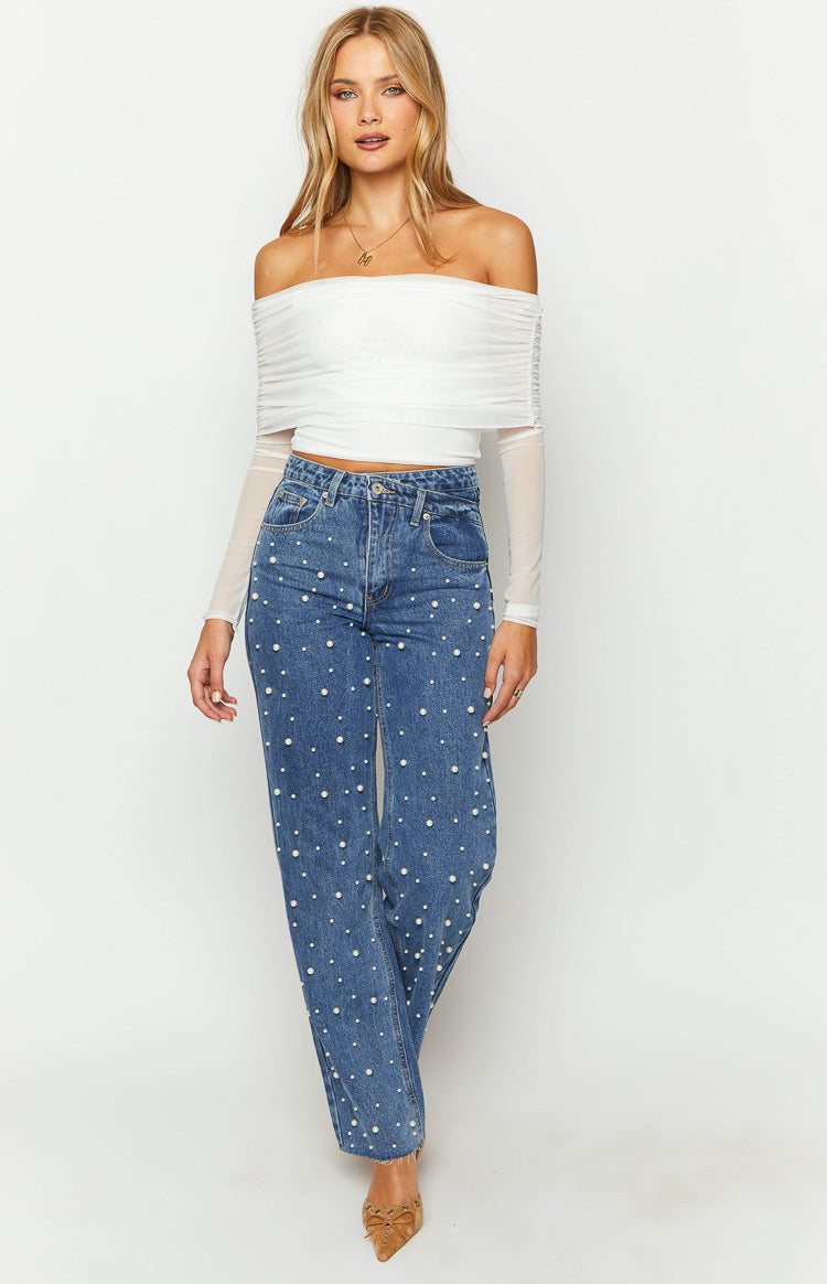 White off-shoulder crop top with a ruched bodice and sheer mesh long sleeves