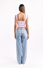 Back view of a light pink crop top with a square neckline and wide shoulder straps