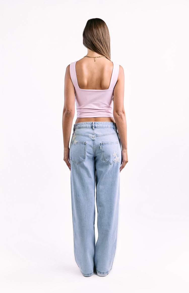 Back view of a light pink crop top with a square neckline and wide shoulder straps