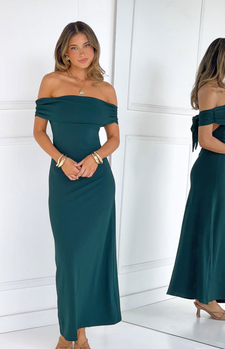 Front view of a teal crepe off-the-shoulder maxi dress with ruched sleeves, back tie detail visible in reflection