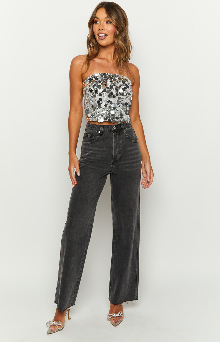 Full length view of charcoal high-waisted straight-leg jeans with a raw hem