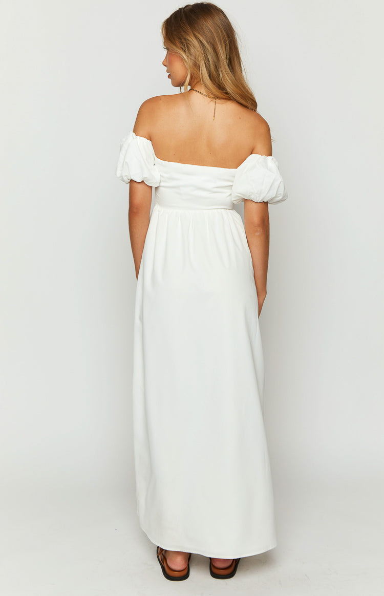 Rear view of a white off-the-shoulder maxi dress with puff sleeves and a fitted bodice