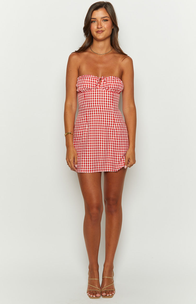Strapless red and white gingham mini dress with a ruched sweetheart neckline and front tie detail