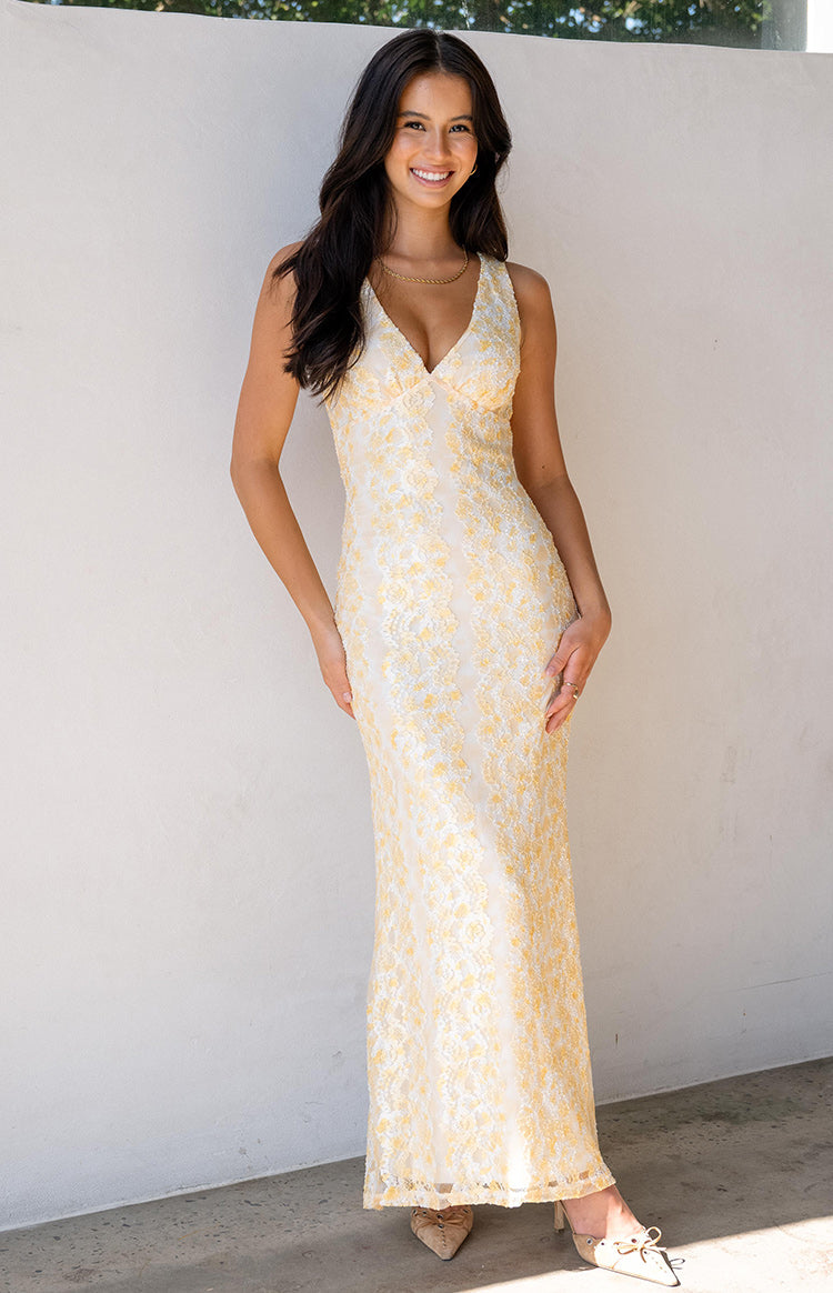 Beginning Boutique Farida Yellow Lace Maxi Dress yellow lace maxi dress with a V-neckline and fitted silhouette