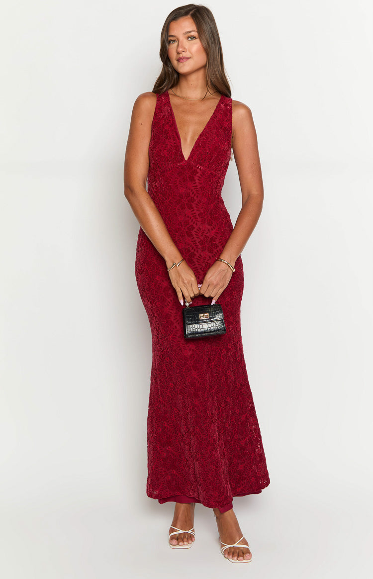 Red sleeveless maxi dress with a deep V-neck, bodycon fit, and subtle floral lace pattern