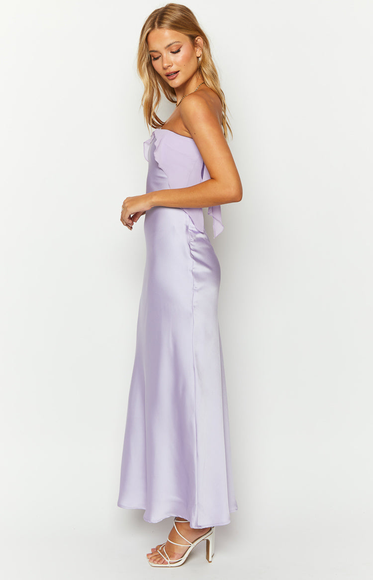 Side view of a purple satin strapless maxi dress with a ruffled neckline and side ruching