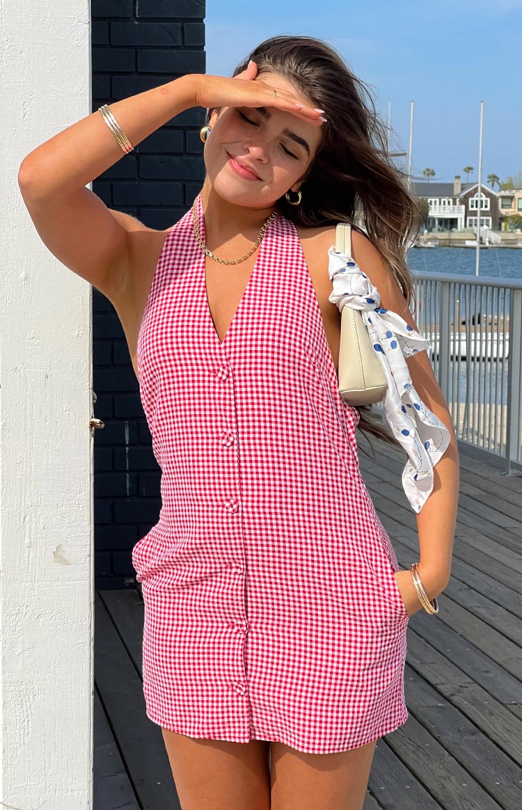 Beginning Boutique Felix Red Gingham Halter Mini Dress red gingham halter V-neck mini dress with button front and side pockets