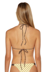Back view of a yellow spot print swim top with adjustable brown ties cute for a Resort trip