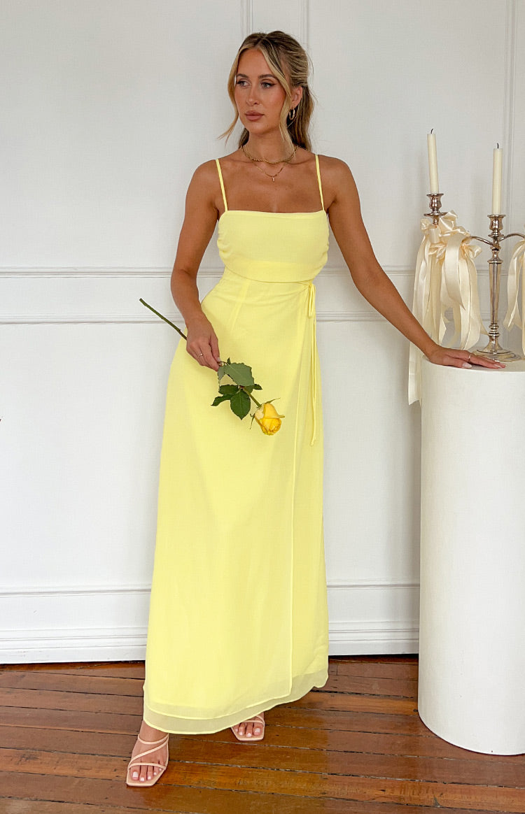 Beginning Boutique Flossie Yellow Maxi Sleeveless Dress yellow straight neck maxi dress with spaghetti straps and a wrap tie waist