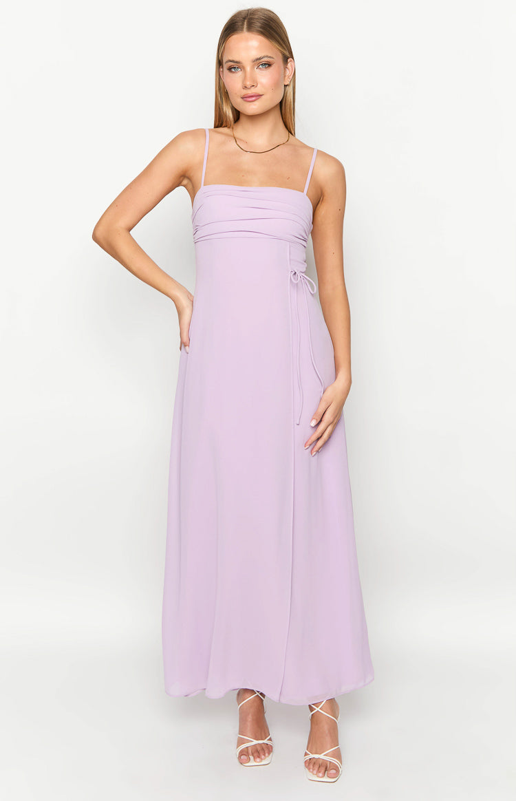 Lilac maxi dress with a square neckline, ruched bodice, and adjustable side tie detail at the waist