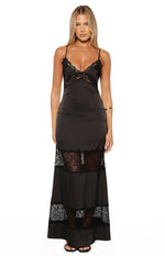 Black satin maxi dress featuring a V-neck, delicate lace trim, thin spaghetti straps, and tiered lace inserts on the skirt