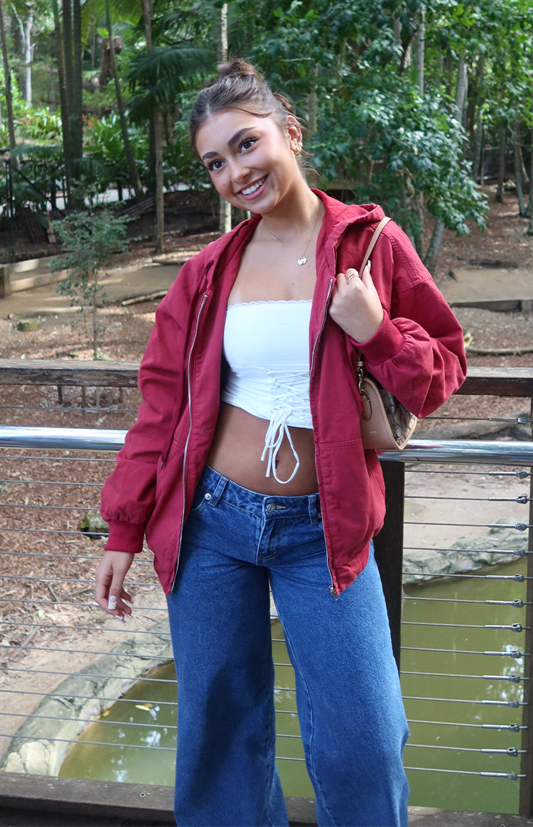 Mid wash blue denim low rise jeans with a wide leg fit