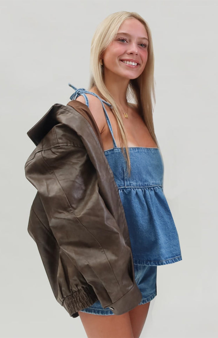 Beginning Boutique Ethel Blue Denim Top blue denim square neck top with tie-up spaghetti straps and a gathered peplum hem