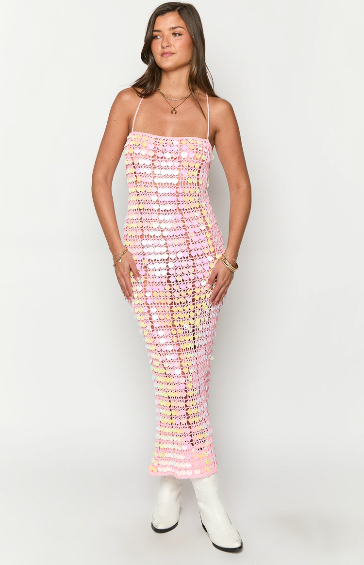 Fitted pink crochet knit maxi dress with thin spaghetti straps and iridescent sequin embellishments