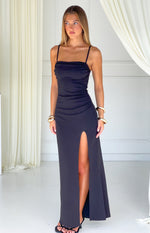 Black crepe maxi dress with a straight neckline, ruched side detail, and high leg slit