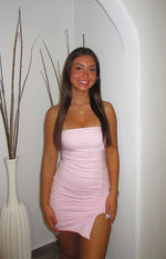 Baby pink strapless bodycon mini dress with side ruching and a high thigh split