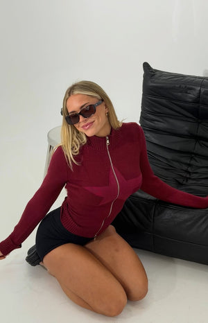 Beginning Boutique Groove Burgundy Star Zip Up Knit Sweater burgundy knit mock neck long sleeve sweater with a front zip and