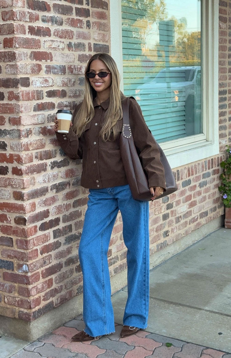 Relaxed fit chocolate brown suedette jacket with a collared neckline, button-front, and chest pockets