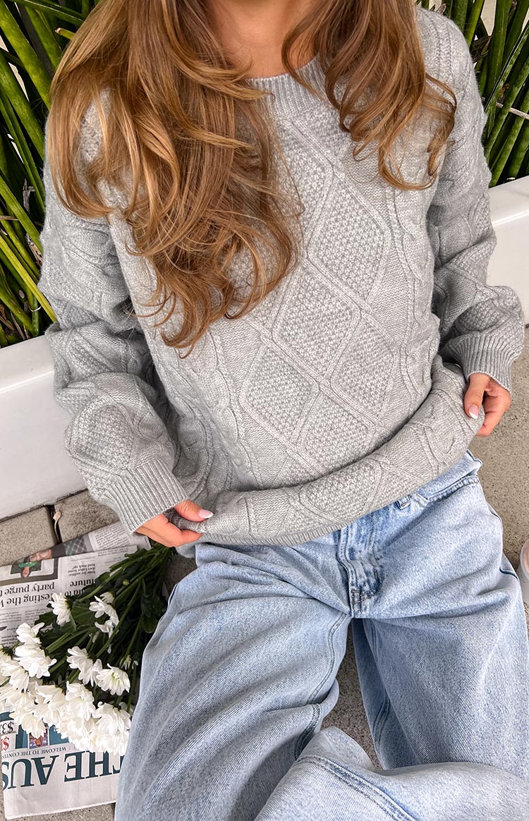 Beginning Boutique Hardy Grey Cable Knit Sweater grey cable knit sweater with diamond pattern, crew neck, long sleeves, and ribbed cuffs and hem