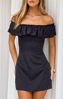 Beginning Boutique Haylie Black Polka Dot Off Shoulder Mini Dress black polka dot off shoulder mini dress with a ruffled neck