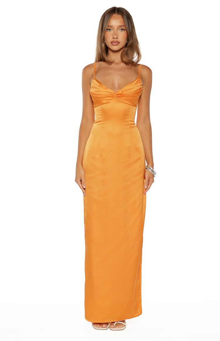 Front view of the honey orange satin maxi dress featuring a ruched sweetheart neckline and fitted silhouette