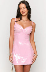 Front view of a pink sequin mini dress with a sweetheart neckline and twisted bust detail
