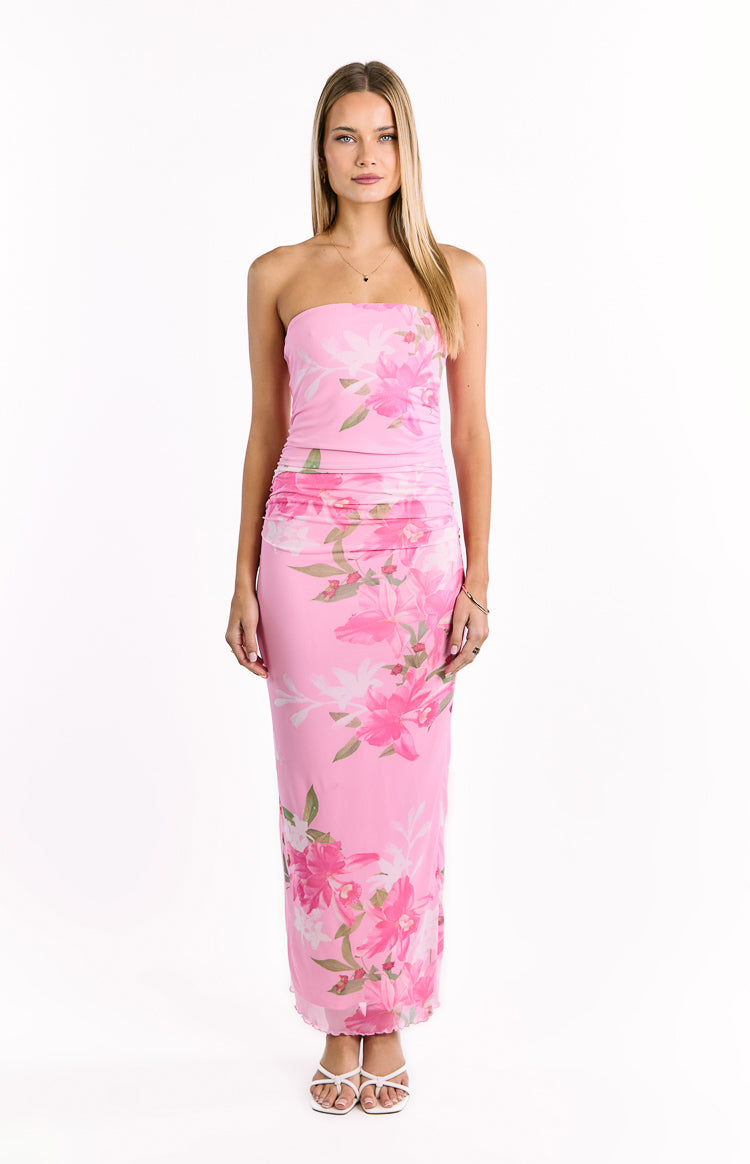 Fitted strapless pink maxi dress with a ruched bodice and green and pink floral print